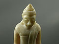 Fossil Wood Buddha Carving