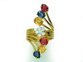 One 18K gold ring, containing six (6) fancy sapphires