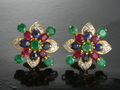 18 K white gold ruby sapphire and emerald with diamond bangle